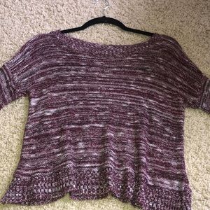 A purple sweater